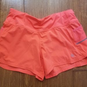 Size small Athleta shorts, bright orange